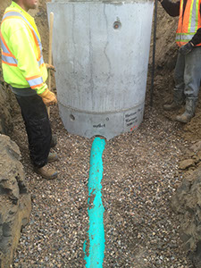 A Municipal (Civic) Storm Sewer manhole is installed by employees of Rite Choice Construction in Saskatoon Saskatchewan.
